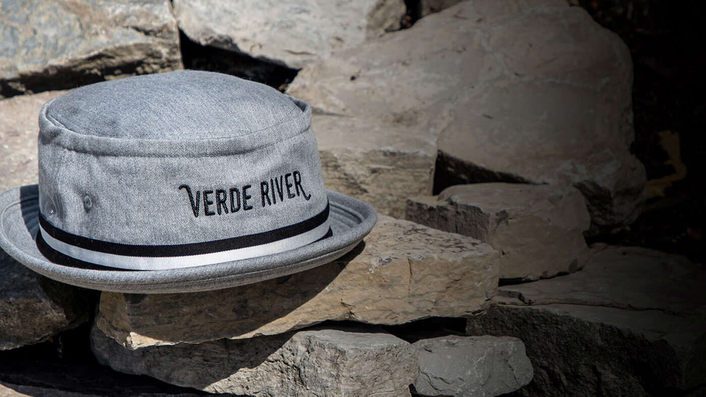 Bucket hats sitting on stone wall