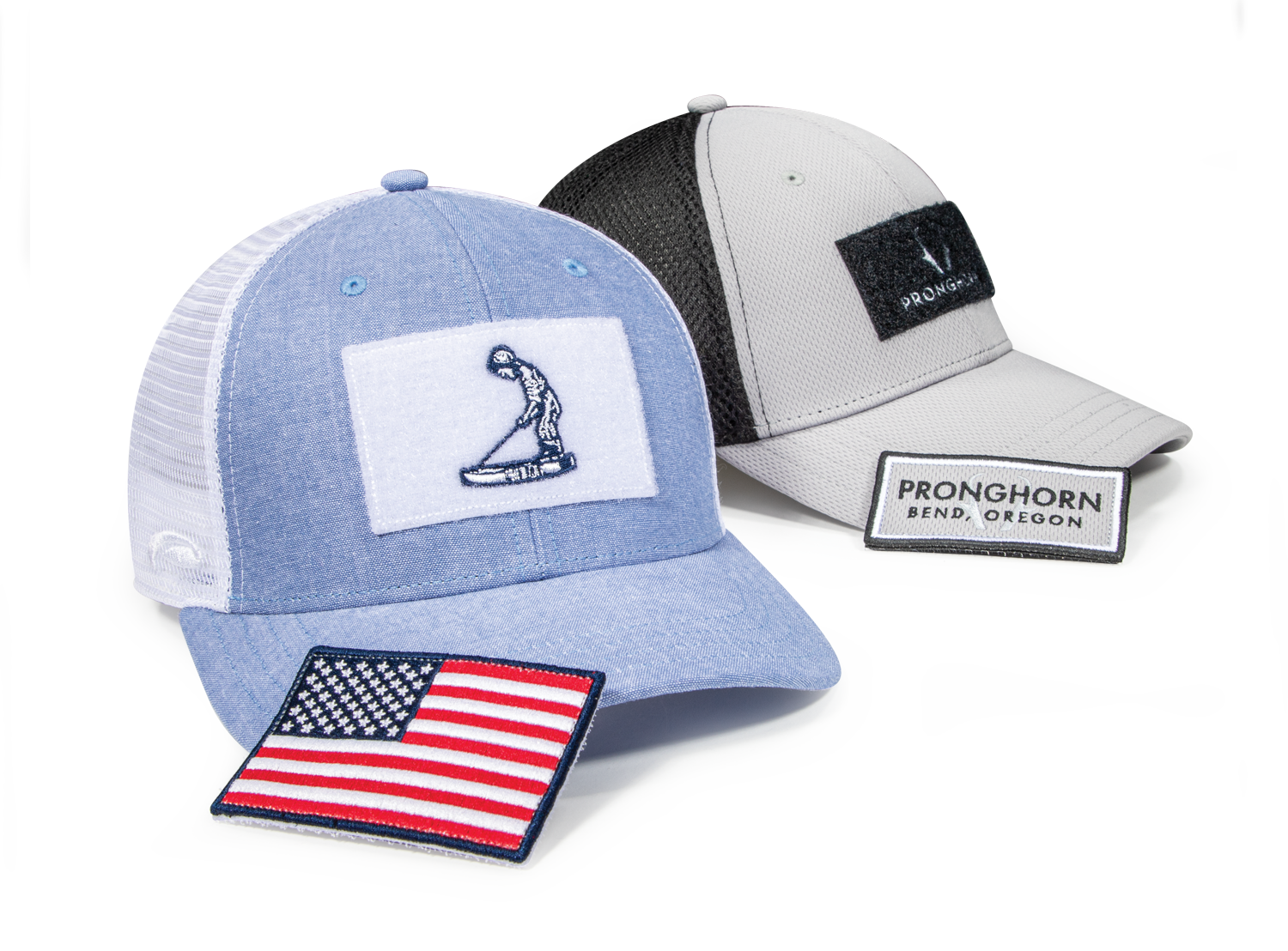 A pair of golf hats with removable top patch custom appliques