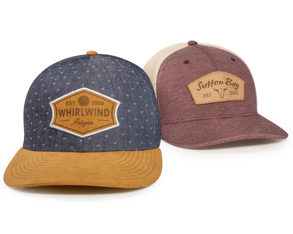 A pair fo golf hats with Laster Etched Patches