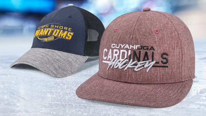 Pair of Hockey hats on a ice hockey rink