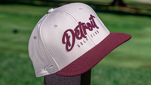 Stretch-Fit Hat at the golf course