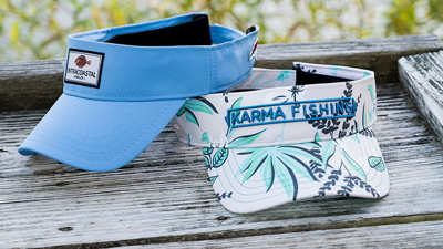 Pukka Low Crown Visor sitting on a log